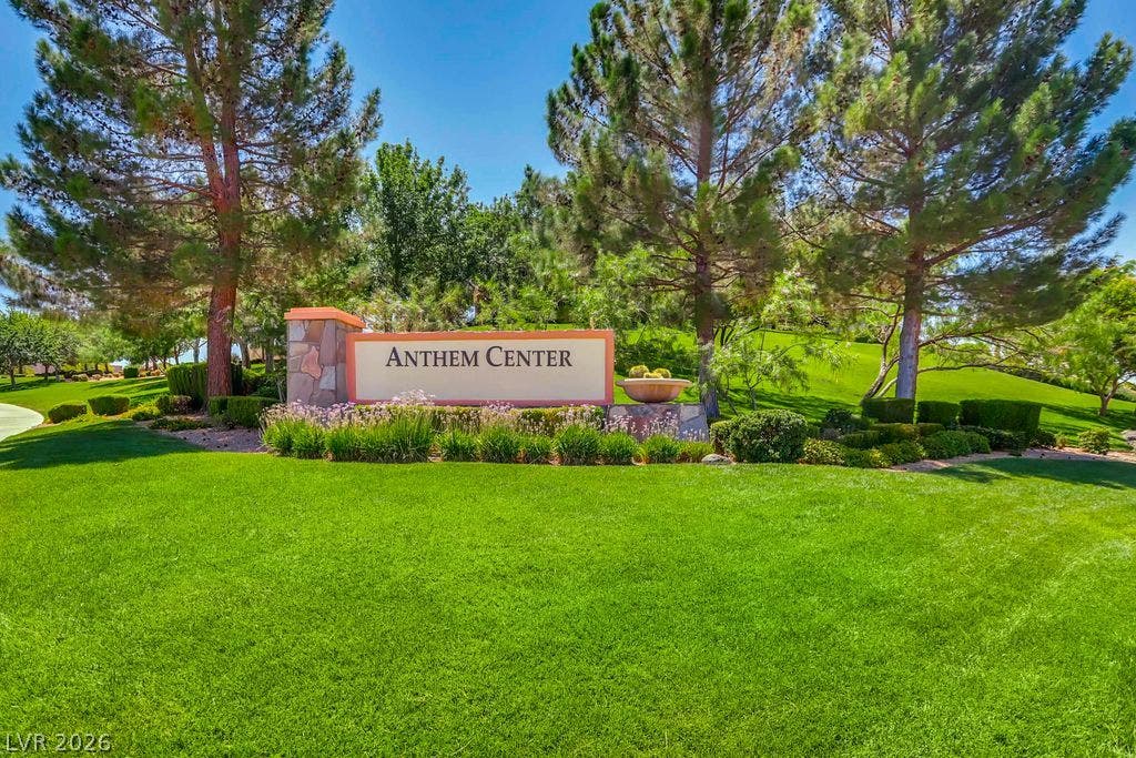 2284 Savannah River Street, Henderson, NV 89044 Mature trees and meticulously manicured lawns surround the stone-accented community monument sign.