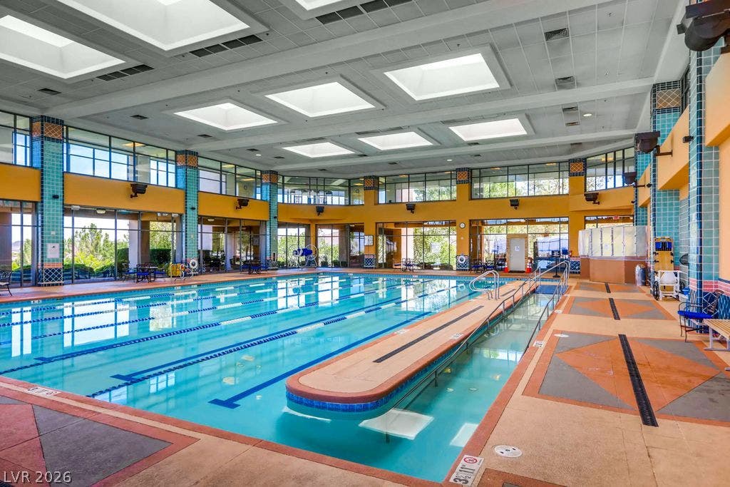 2284 Savannah River Street, Henderson, NV 89044 Geometric skylights illuminate the expansive indoor swimming pool surrounded by tiled walls.