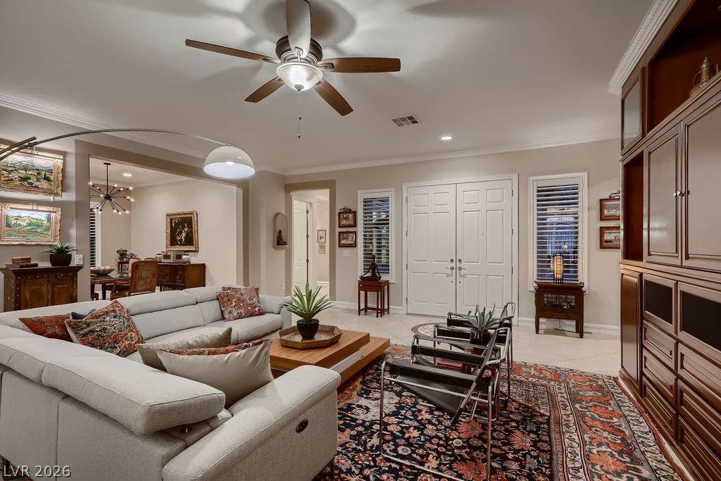2284 Savannah River Street, Henderson, NV 89044 Elegant crown molding complements the open layout of this inviting living space.