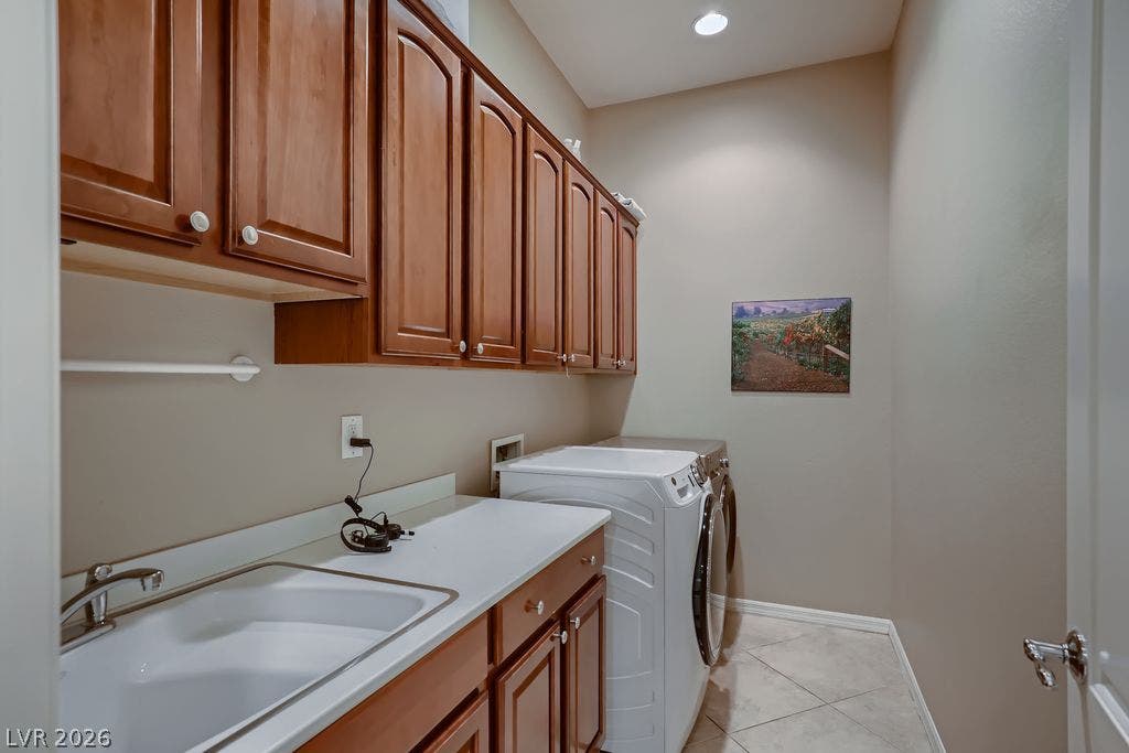 2284 Savannah River Street, Henderson, NV 89044 Ample cabinetry and tile flooring define this highly functional workspace.