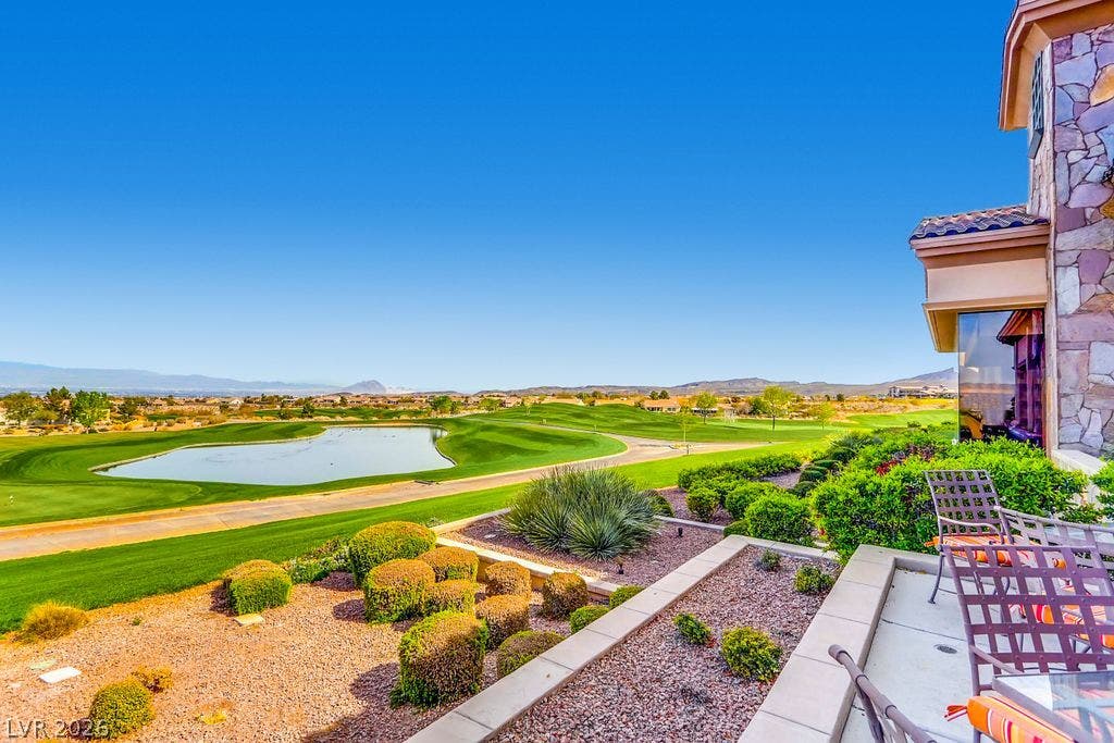 2284 Savannah River Street, Henderson, NV 89044 Lush fairways and a serene water feature highlight the expansive views from this elevated patio.