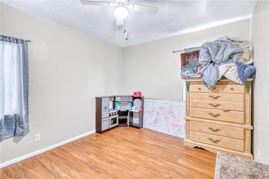 Gleaming wood-inspired flooring anchors this versatile space, ready for your customization.