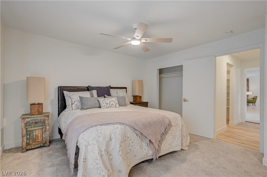 2101 Santiago Street, Las Vegas, NV 89104 Plush carpeting and clean architectural lines define this comfortable bedroom space.