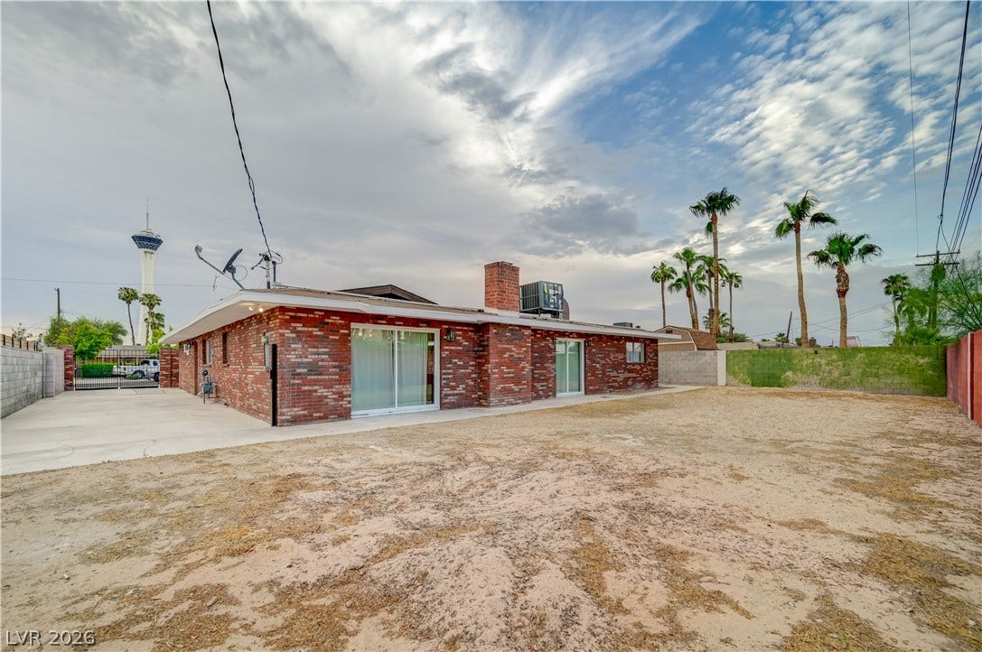 2101 Santiago Street, Las Vegas, NV 89104 A spacious rear yard surrounds this classic brick residence under wide open desert skies.