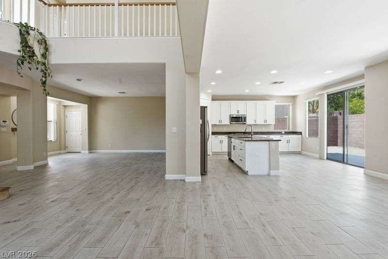10464 Calico Pines Avenue, Las Vegas, NV 89135 An open layout connects the spacious living areas with a modern central kitchen.