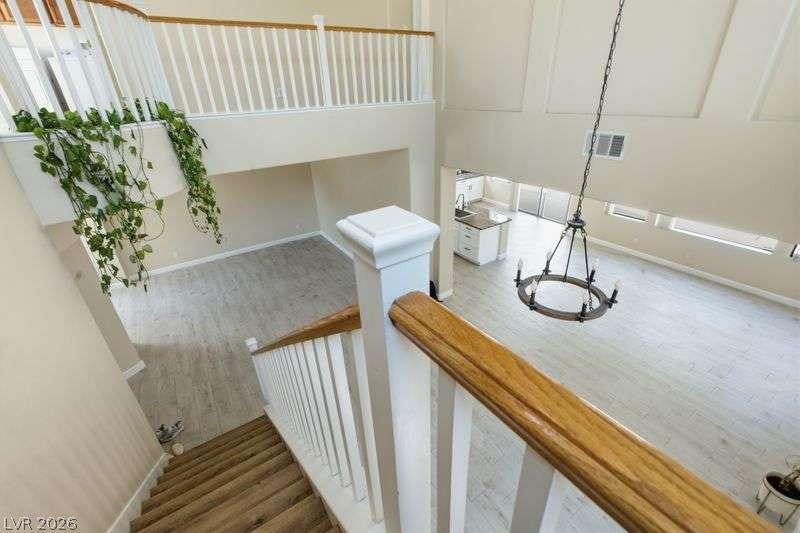 10464 Calico Pines Avenue, Las Vegas, NV 89135 Soaring ceilings and an airy open floorplan look down onto the spacious main living areas.