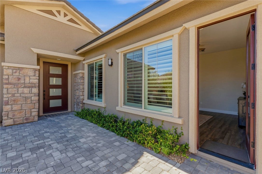 Secondary SUITE features Bedroom AND Separate living room.  Has a private en-suite and private entrance.