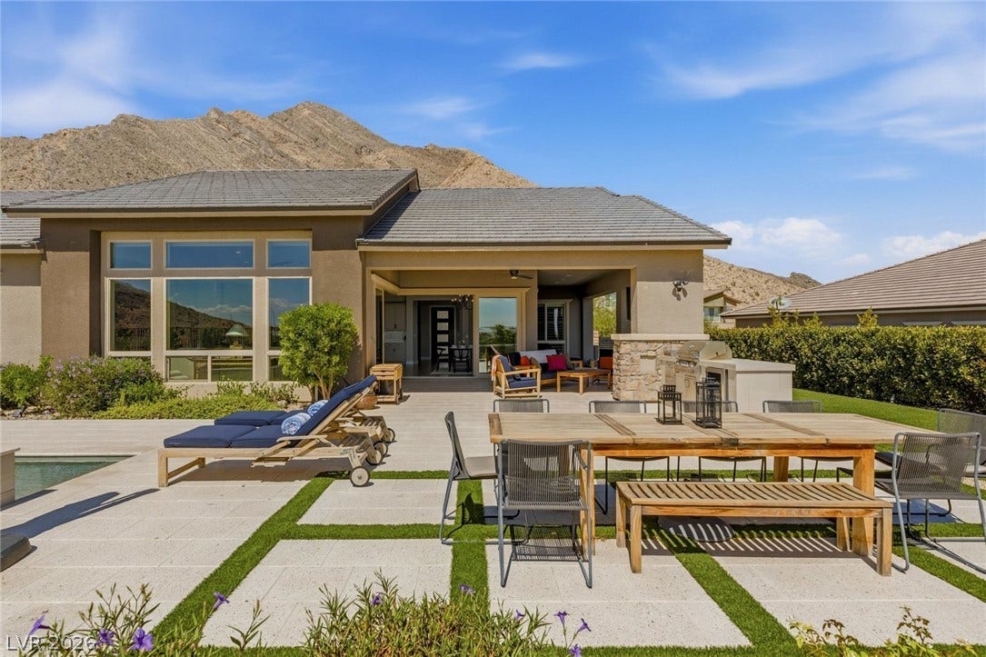 Outdoor BBQ, dining and large turf area for relaxing.