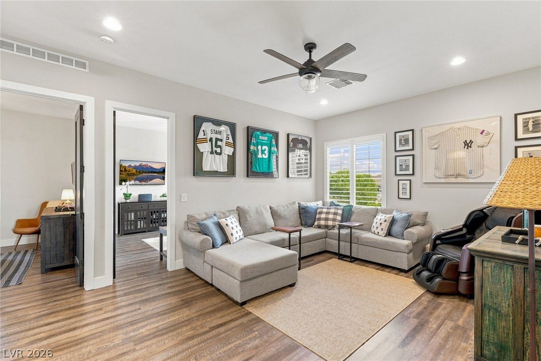 Expansive den, perfectly positioned between the secondary bedrooms.