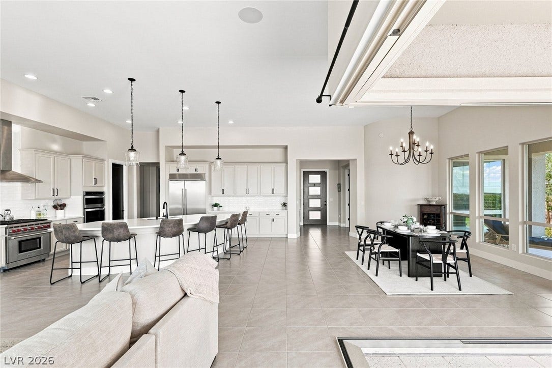 An open floorplan seamlessly connects the kitchen and dining areas.  Perfect for entertaining or everyday living.
