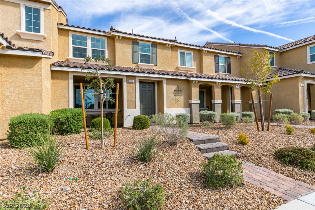 3179 Brynley Avenue, Henderson, NV 89044 Clay tile roofs and warm stucco facades define this beautifully landscaped multi-unit exterior.