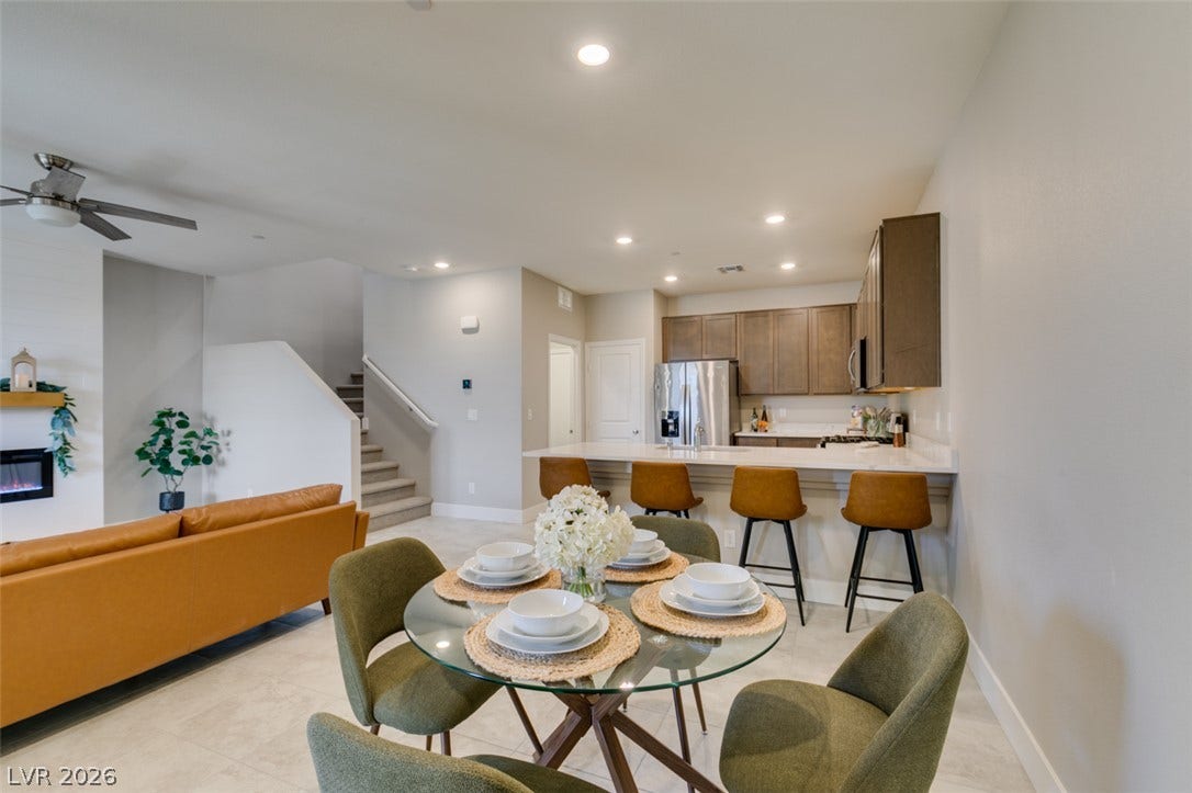 3179 Brynley Avenue, Henderson, NV 89044 Smooth tile flooring extends from the comfortable dining alcove into an open kitchen workspace.