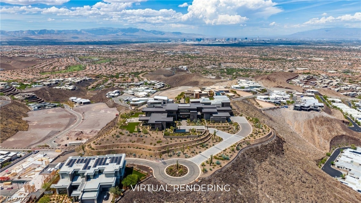 2 Epic View Court, Henderson, NV 89012 Panoramic mountain and distant city views surround this impressive hillside estate. Sample Architecture added on the lot.