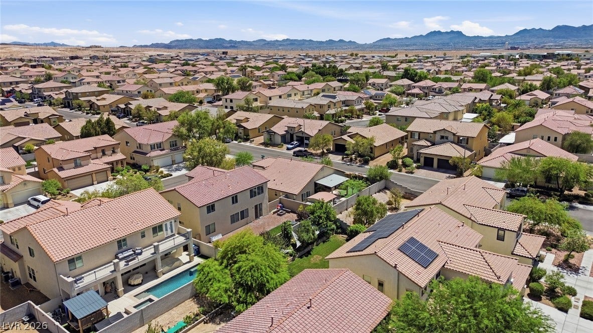 2607 Fading Night Court, Las Vegas, NV 89142 Nestled within a quiet neighborhood, this home features solar roofing and a private swimming pool.