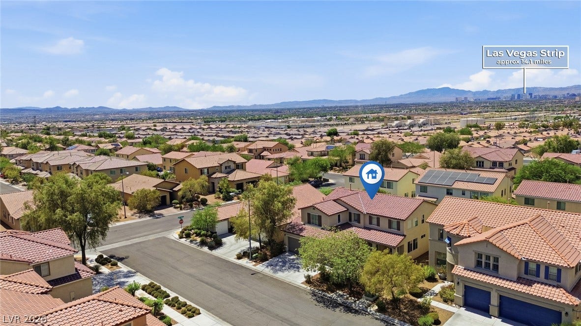 2607 Fading Night Court, Las Vegas, NV 89142 Distant mountain ranges frame this tranquil residential neighborhood of tiled-roof homes.