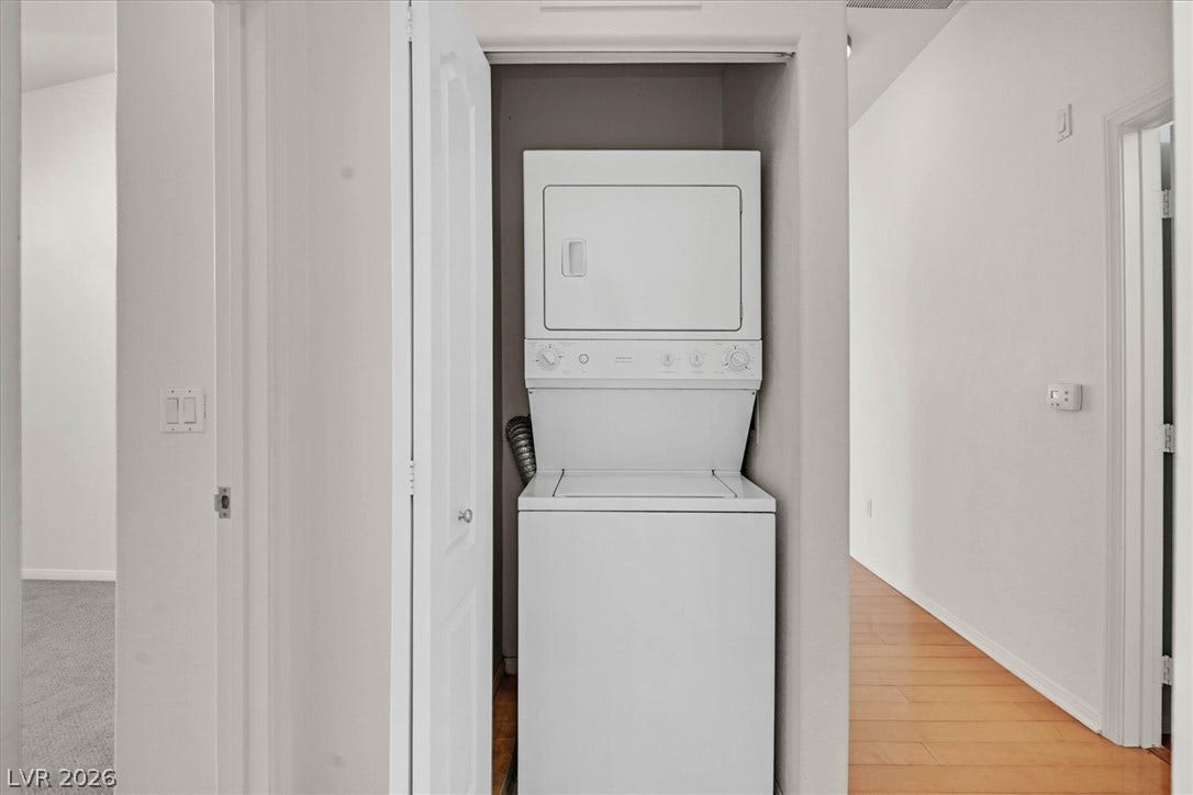 700 Carnegie Street, #2924, Henderson, NV 89052 An in-unit stacked laundry setup maximizes space off the hallway.