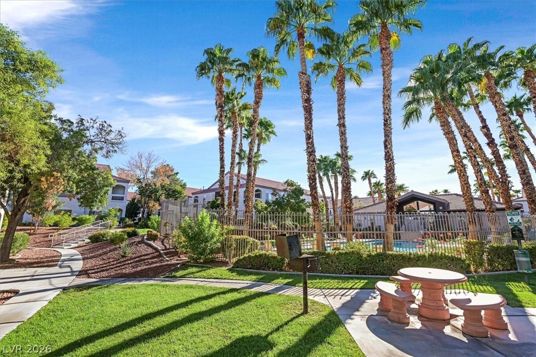 700 Carnegie Street, #2924, Henderson, NV 89052 Manicured lawns and soaring palm trees frame the community recreation areas.