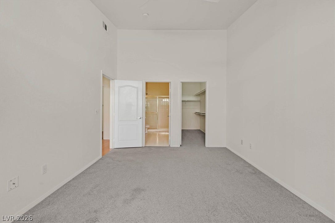 700 Carnegie Street, #2924, Henderson, NV 89052 High ceilings and clean carpeting define this spacious main bedroom suite with attached bath.