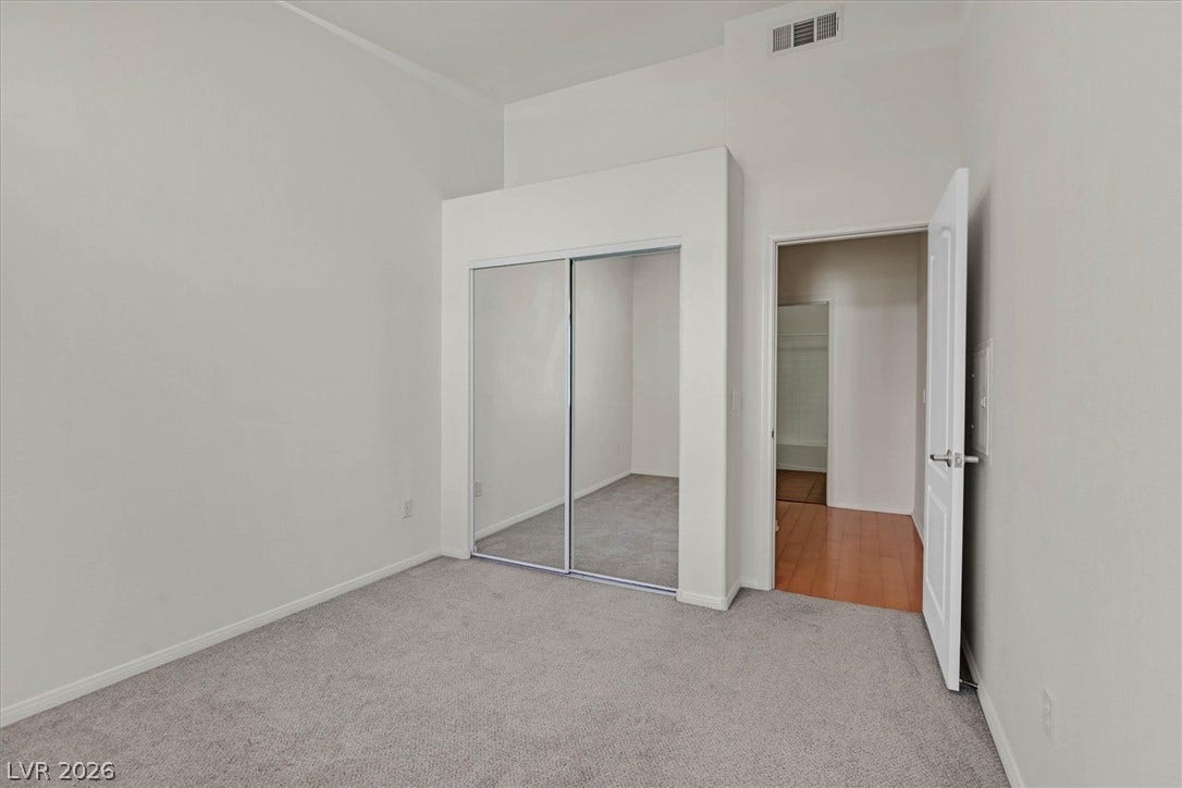 700 Carnegie Street, #2924, Henderson, NV 89052 High ceilings and soft carpeting define this quiet secondary bedroom space.
