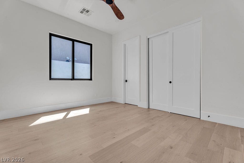 2690 Grassy Spring Place, Las Vegas, NV 89135 Minimalist design shines with smooth plaster walls and light oak hardwood flooring.
