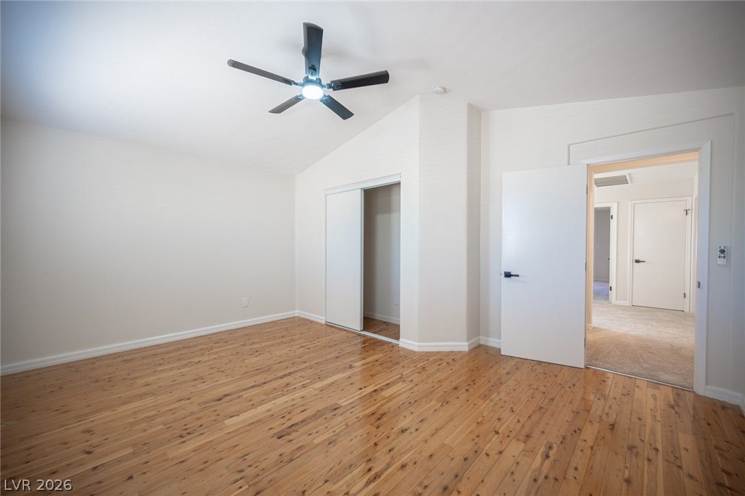 6133 Crystal Talon Street, Las Vegas, NV 89130 Polished hardwood flooring and vaulted plasterwork define this versatile bedroom #4.