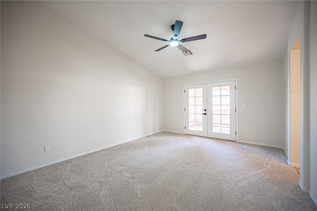 6133 Crystal Talon Street, Las Vegas, NV 89130 Plush carpeting and vaulted ceilings define this inviting space complete with double doors in the primary bedroom