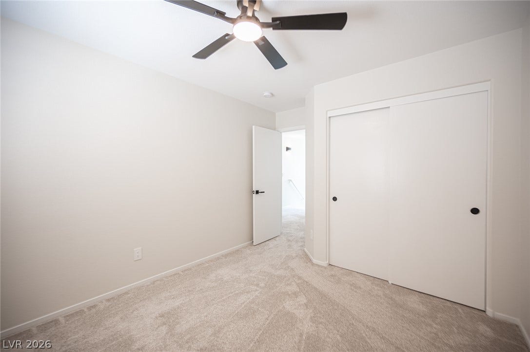6133 Crystal Talon Street, Las Vegas, NV 89130 Plush carpeting and crisp white trim define this clean, modern bedroom #3.