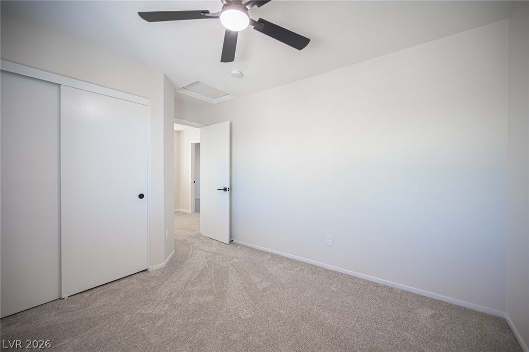 6133 Crystal Talon Street, Las Vegas, NV 89130 Plush carpeting and crisp white walls create a clean canvas for any design style bedroom #2.