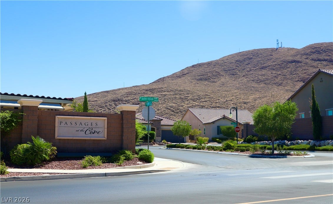 Welcome to a neighborhood framed by dramatic mountain backdrops and serene paved streets.
