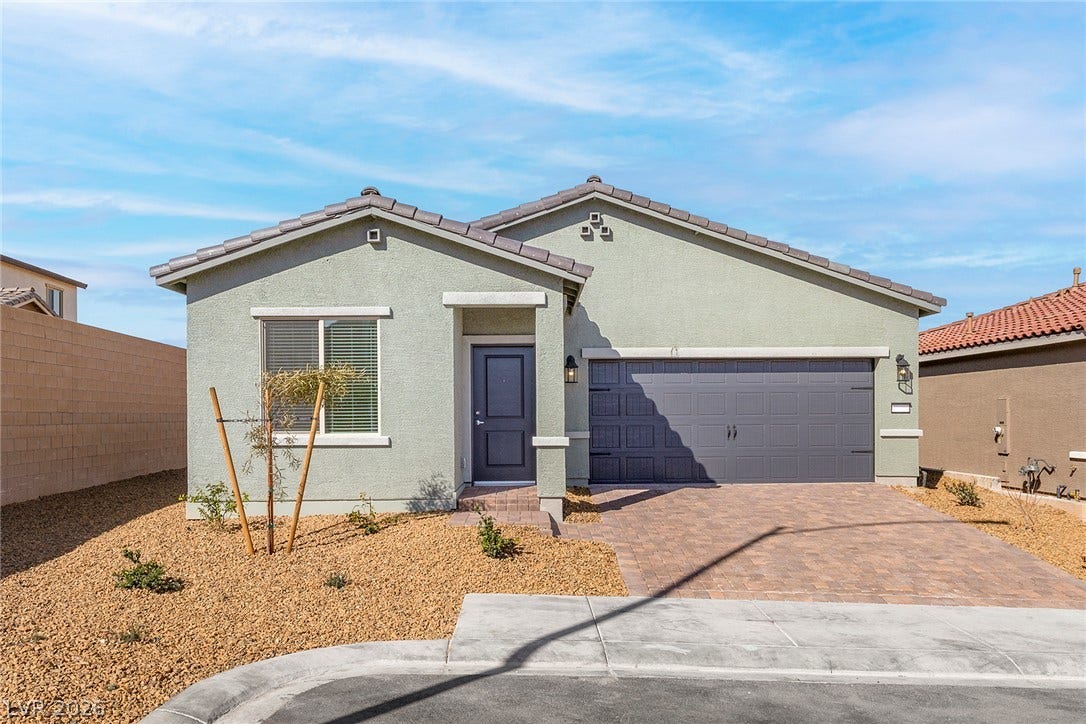 2754 Avril Point Street, Las Vegas, NV 89156 Clean lines and classic stucco styling define the exterior of this single-story home.