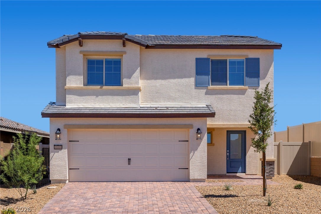 6740 Magnolia River Avenue, Las Vegas, NV 89156 An inviting exterior features a paved driveway, stucco finishes, and a classic tile roof.