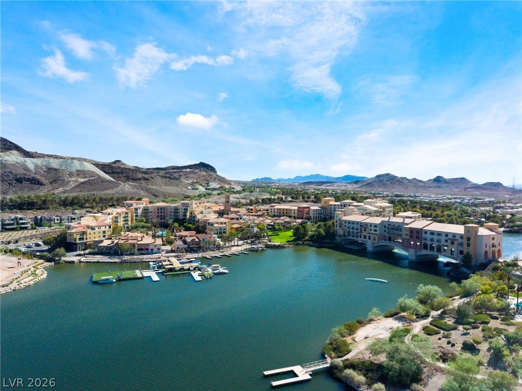 72 Rezzonico Drive, Henderson, NV 89011 A tranquil lake serves as the centerpiece of this scenic mountain-backed community.