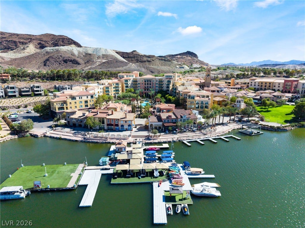 72 Rezzonico Drive, Henderson, NV 89011 Scenic lakeside village views frame the private docks and direct water access.