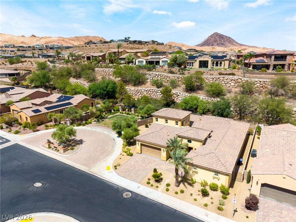 72 Rezzonico Drive, Henderson, NV 89011 Desert-inspired architecture harmonizes with rugged mountain ridges and clear open skies.