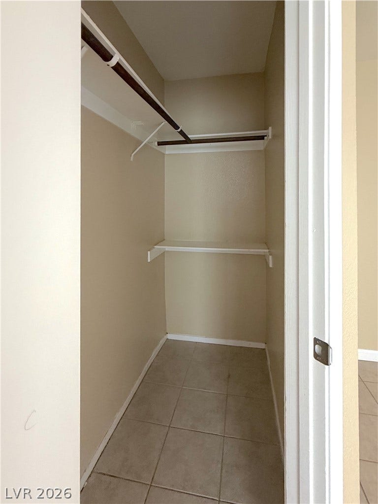 601 Avon Avenue, Henderson, NV 89014 Tiled flooring and built-in shelving maximize the utility of this closet space.