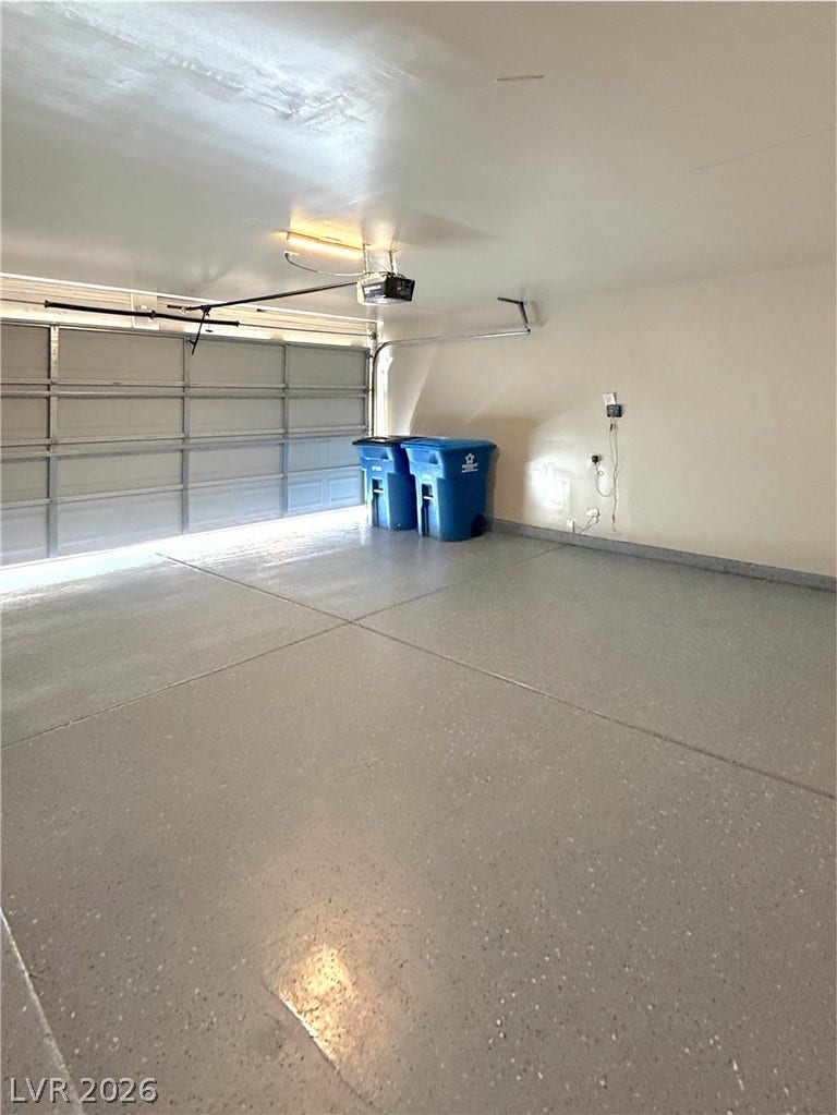 601 Avon Avenue, Henderson, NV 89014 Smooth concrete floors and finished walls define this clean vehicle storage area.