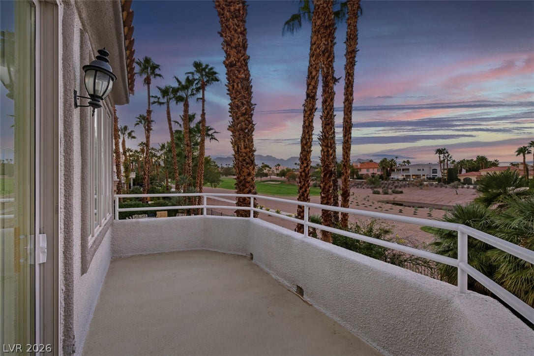 8848 Rainbow Ridge Drive, Las Vegas, NV 89117 Sunset views over the golf course unfold from this elevated concrete balcony.