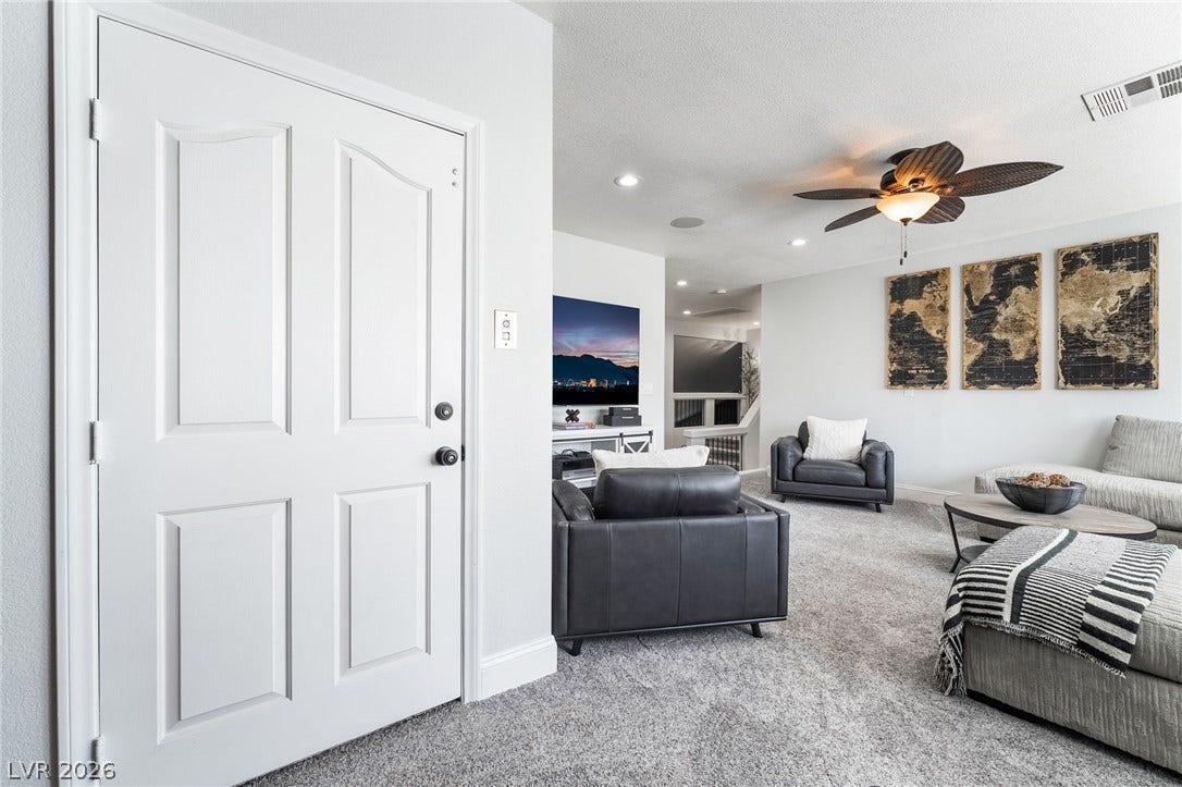 826 Rising Star Drive, Henderson, NV 89014 Soft wall-to-wall carpeting and recessed lighting create a comfortable atmosphere throughout this space.