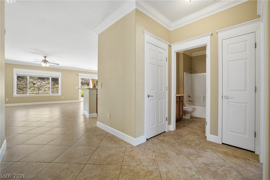 2247 Shadow Canyon Drive, Henderson, NV 89044 Classic crown molding and durable tile flooring define this spacious entryway leading into the main living areas.