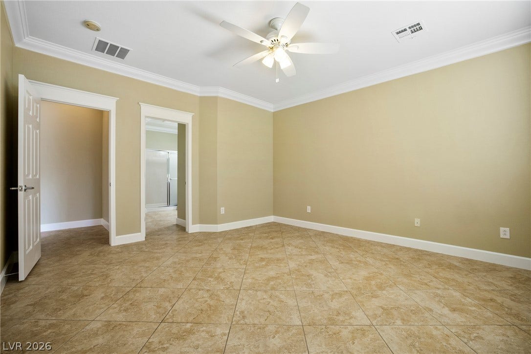 2247 Shadow Canyon Drive, Henderson, NV 89044 Crisp crown molding and durable tile flooring define this versatile interior space.