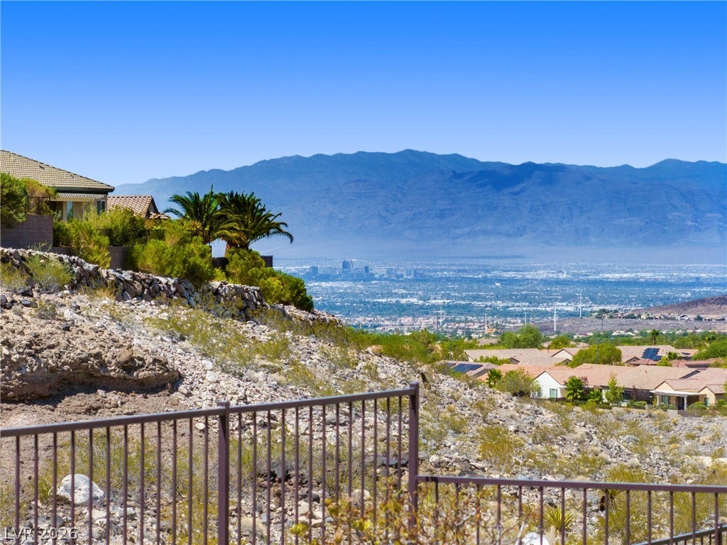2247 Shadow Canyon Drive, Henderson, NV 89044 Sweeping mountain and valley vistas stretch across the horizon beyond the secure perimeter fence.
