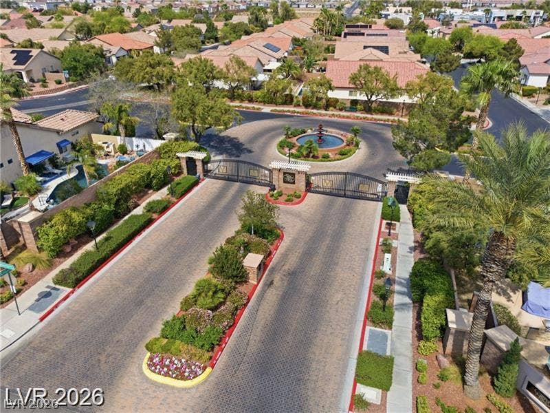 10605 Bardilino Street, Las Vegas, NV 89141 A secure gated entrance welcomes residents to this manicured suburban neighborhood.