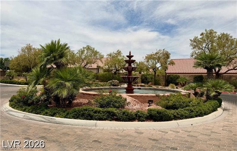 10605 Bardilino Street, Las Vegas, NV 89141 An elegant tiered stone fountain anchors the professionally landscaped rotary.