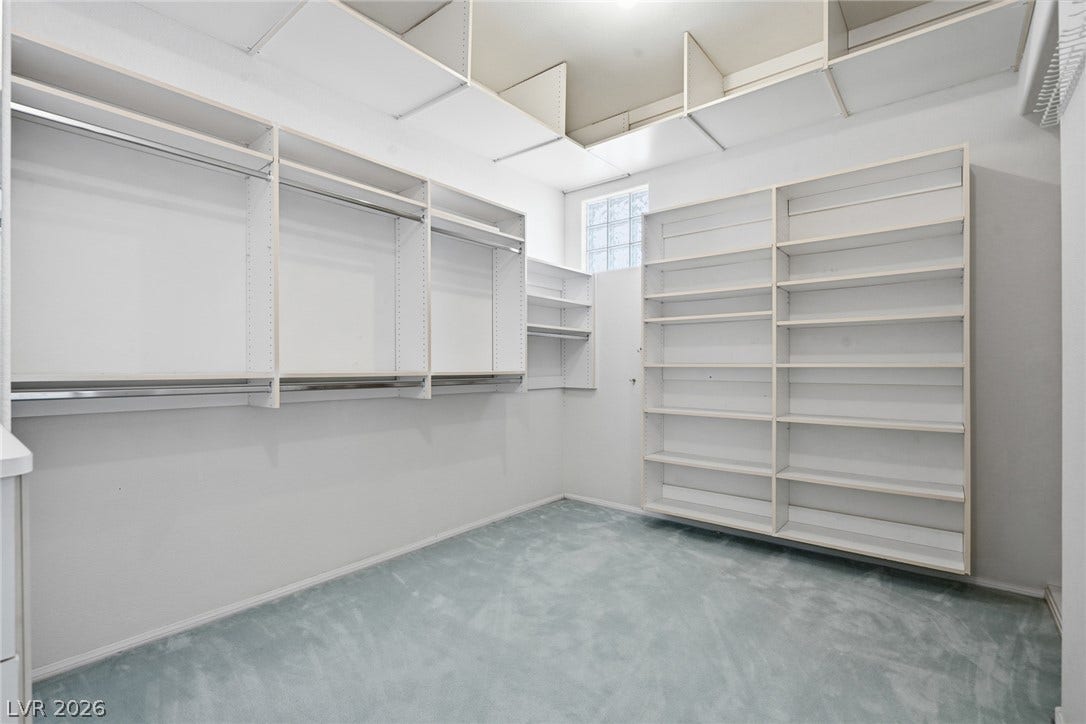 2212 Chatsworth Court, Henderson, NV 89074 Ample shelving and hanging space defines this generously proportioned walk-in closet.