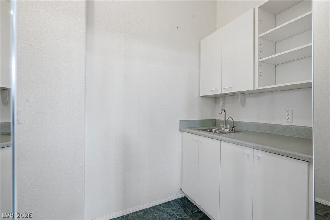 2212 Chatsworth Court, Henderson, NV 89074 Functional utility space featuring ample storage and a convenient sink.