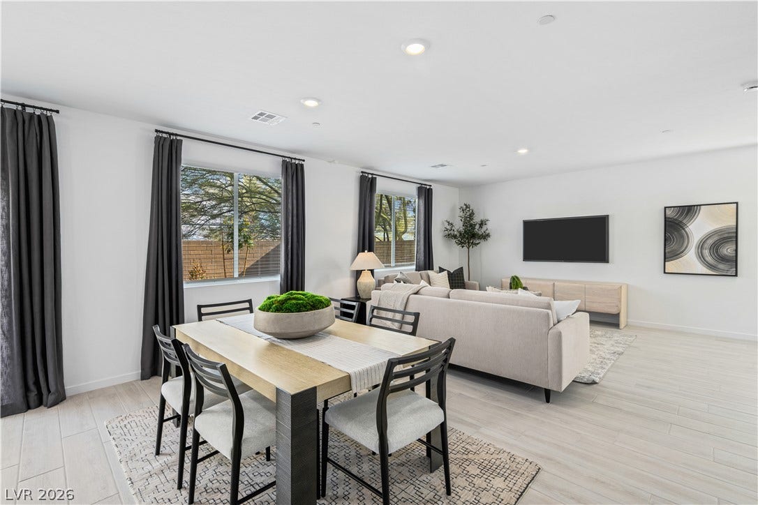 132 Harper Crest Avenue, Henderson, NV 89011 Clean lines and light flooring define this open-concept dining and living space.