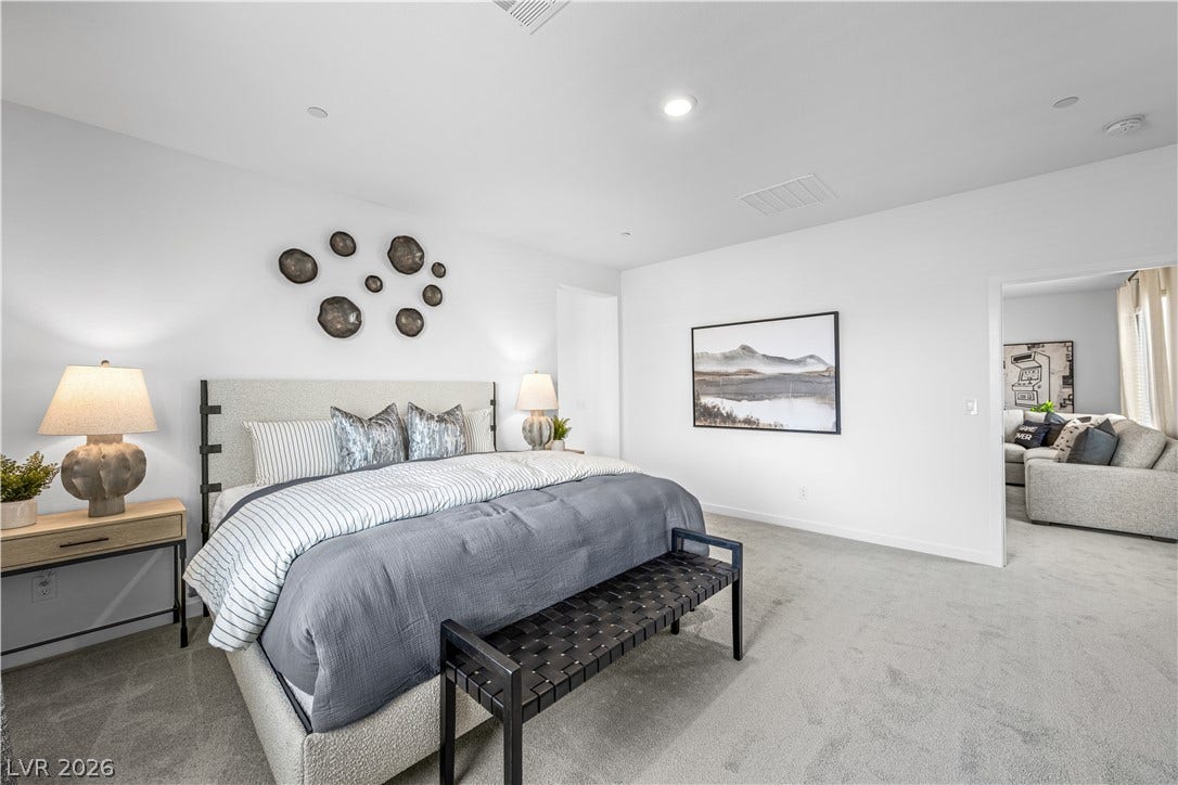 132 Harper Crest Avenue, Henderson, NV 89011 Plush carpeting underfoot and recessed lighting create a serene and inviting atmosphere.