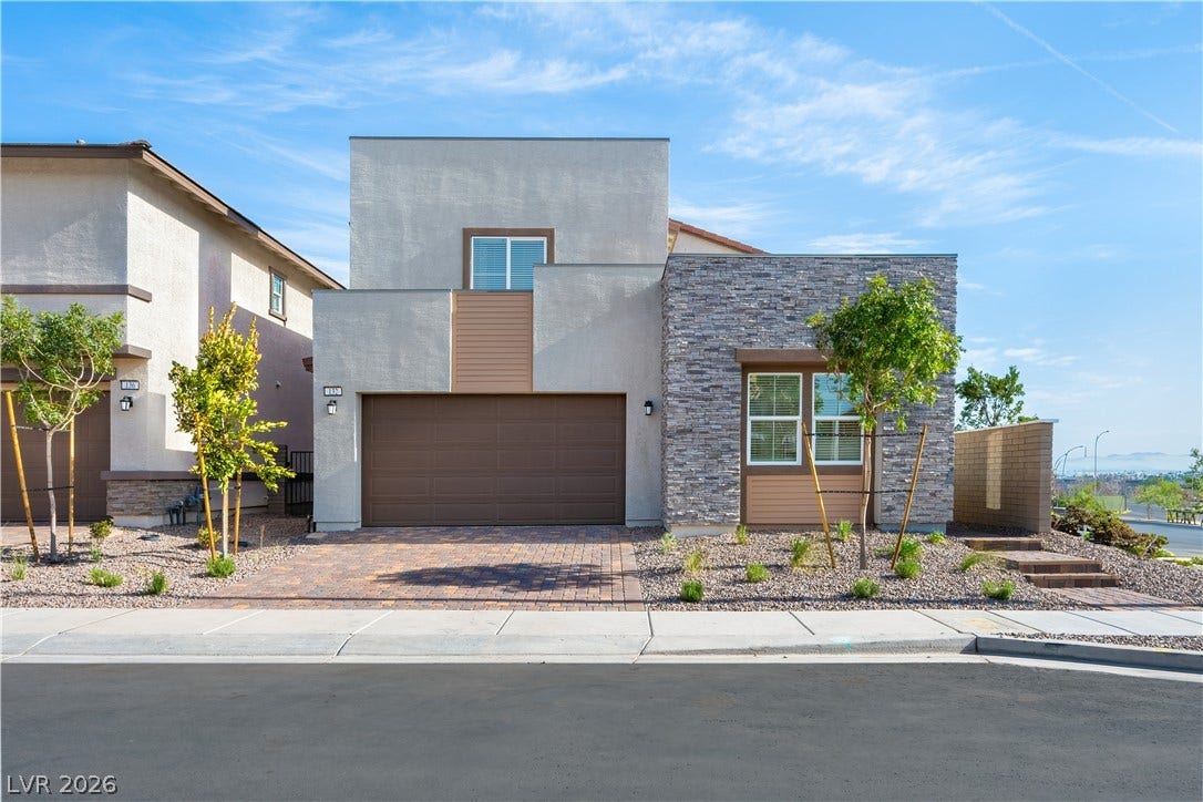 132 Harper Crest Avenue, Henderson, NV 89011 Striking contemporary exterior lines blend natural stone veneer with crisp stucco and geometric detailing.