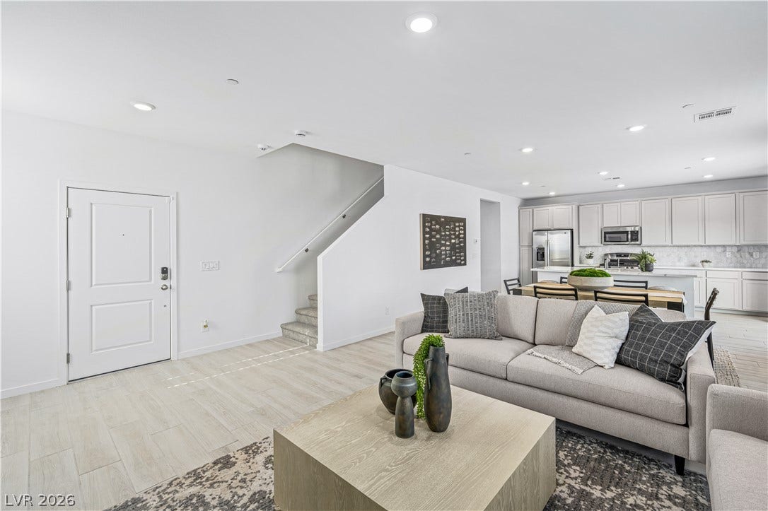 132 Harper Crest Avenue, Henderson, NV 89011 Clean lines and recessed lighting define this modern open-concept floor plan near the entryway.