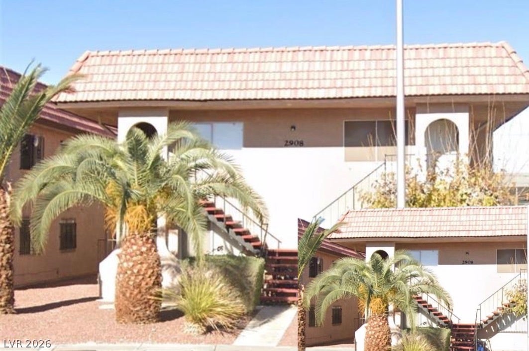 Spanish tile roofing and stucco siding define the exterior of this multi-level residential building.